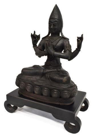 TIBETAN BRONZE FOUR-ARM BUDDHA