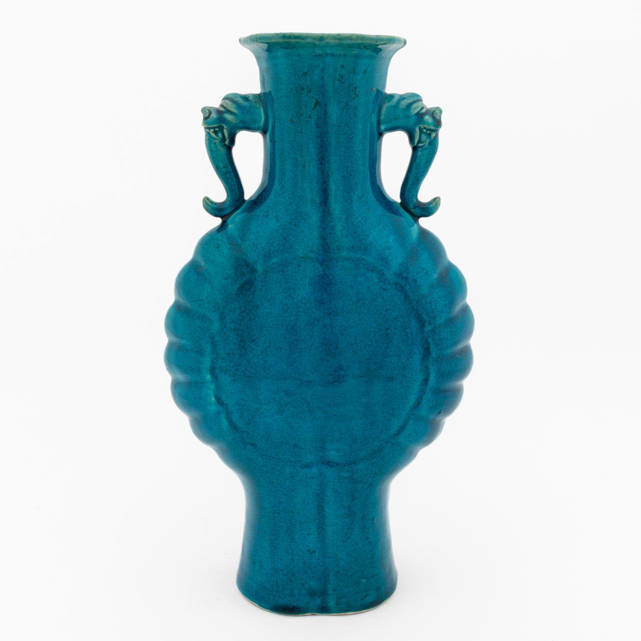 TURQUOISE GLAZED ANIMAL SHAPE HANDLED 35c160