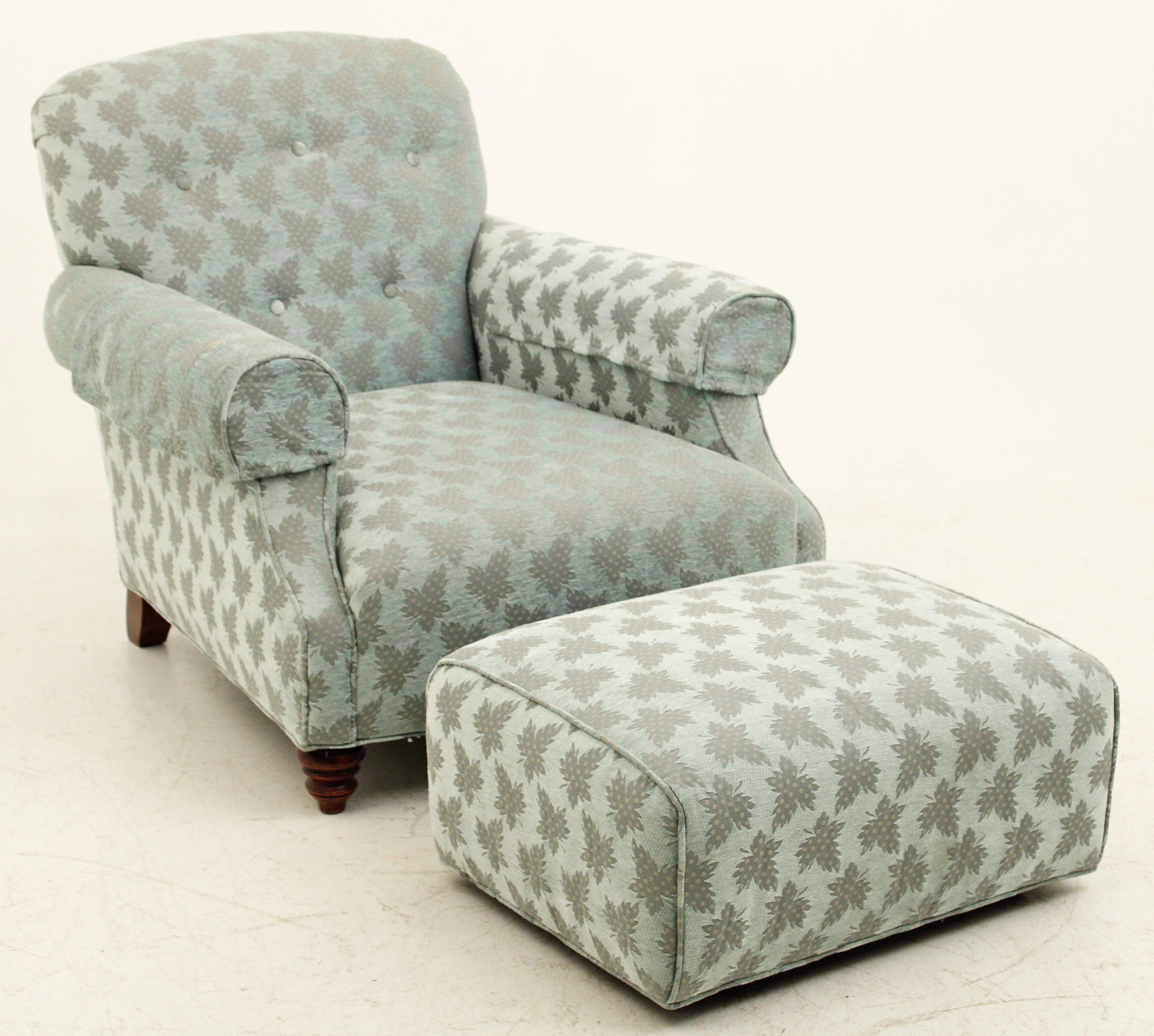UPHOLSTERED ARM CHAIR AND OTTAMAN,