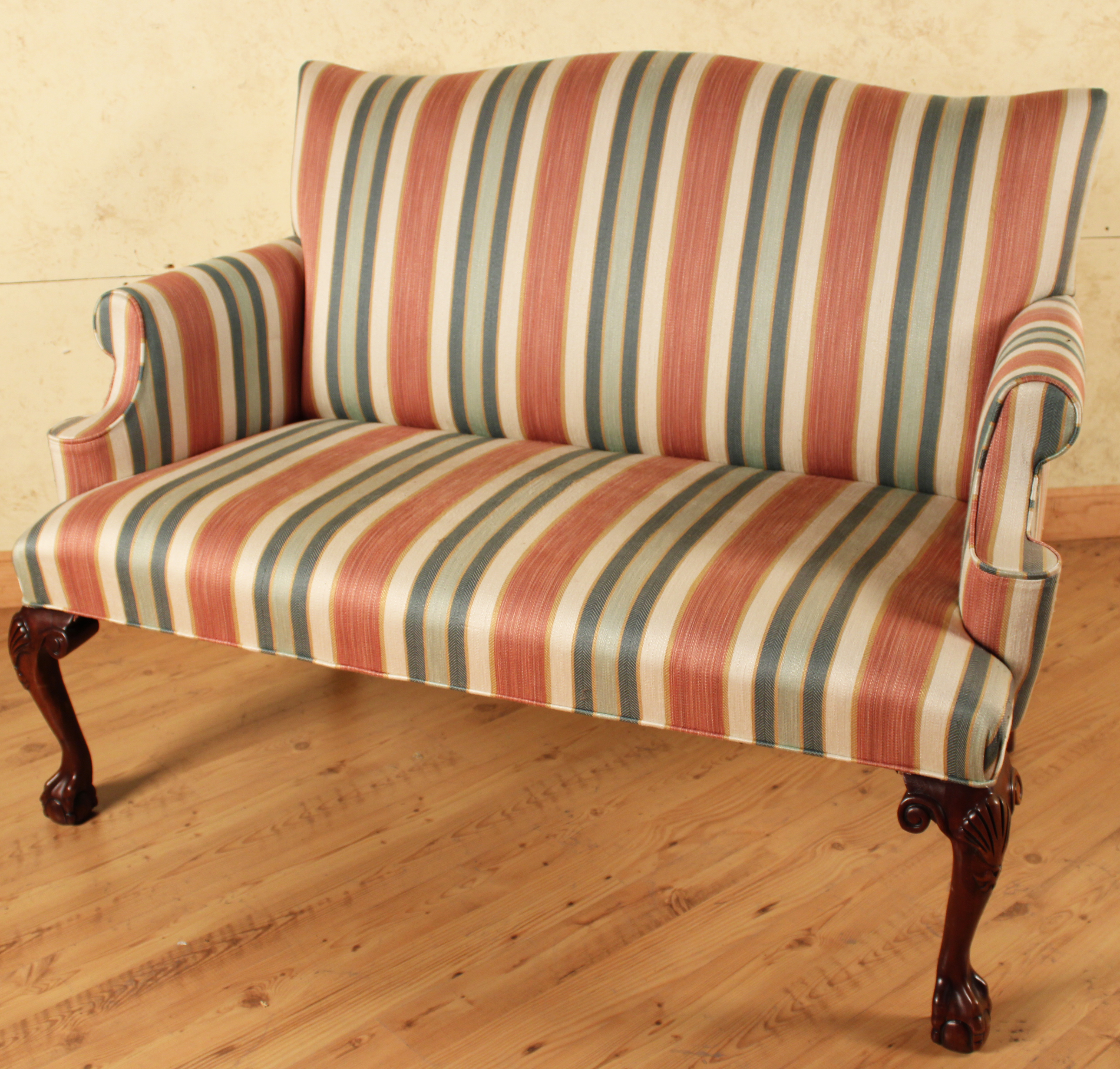 CHIPPENDALE STYLE ROLL ARM SETTEE