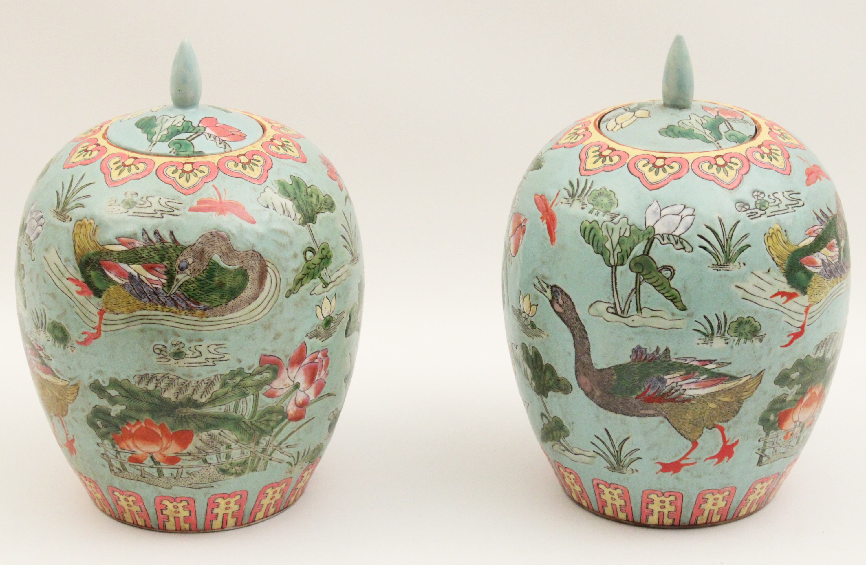 PAIR OF ORIENTAL PORCELAIN CAPPED 35f27f