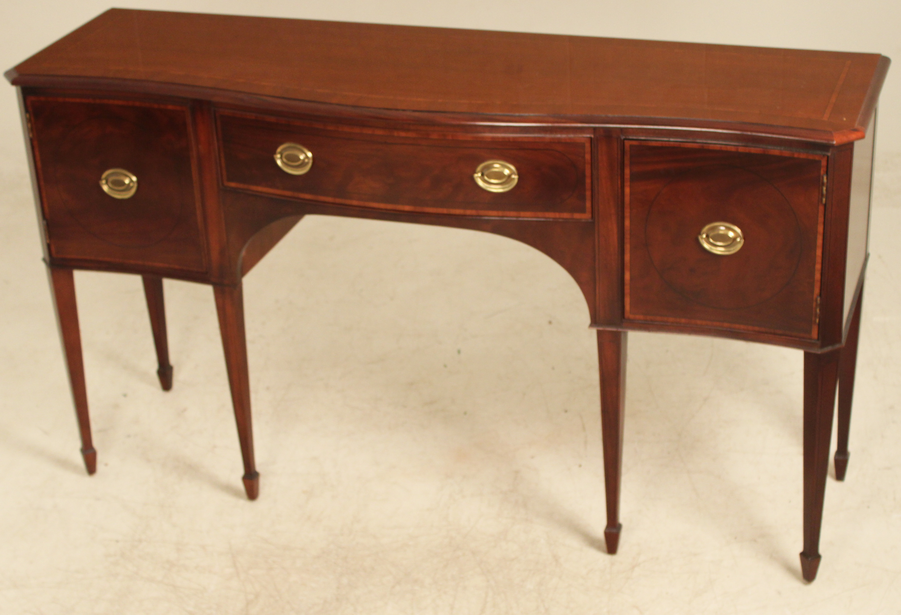 BAKER SERPENTINE MAHOGANY SIDEBOARD