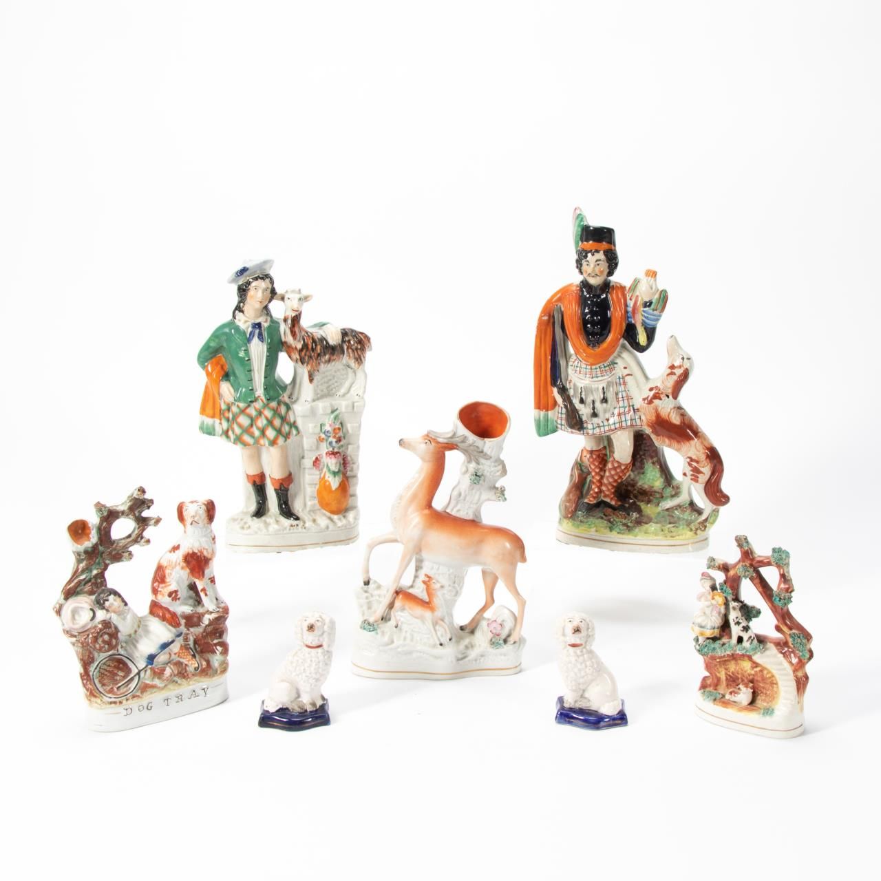 SEVEN STAFFORDSHIRE POTTERY FIGURES,