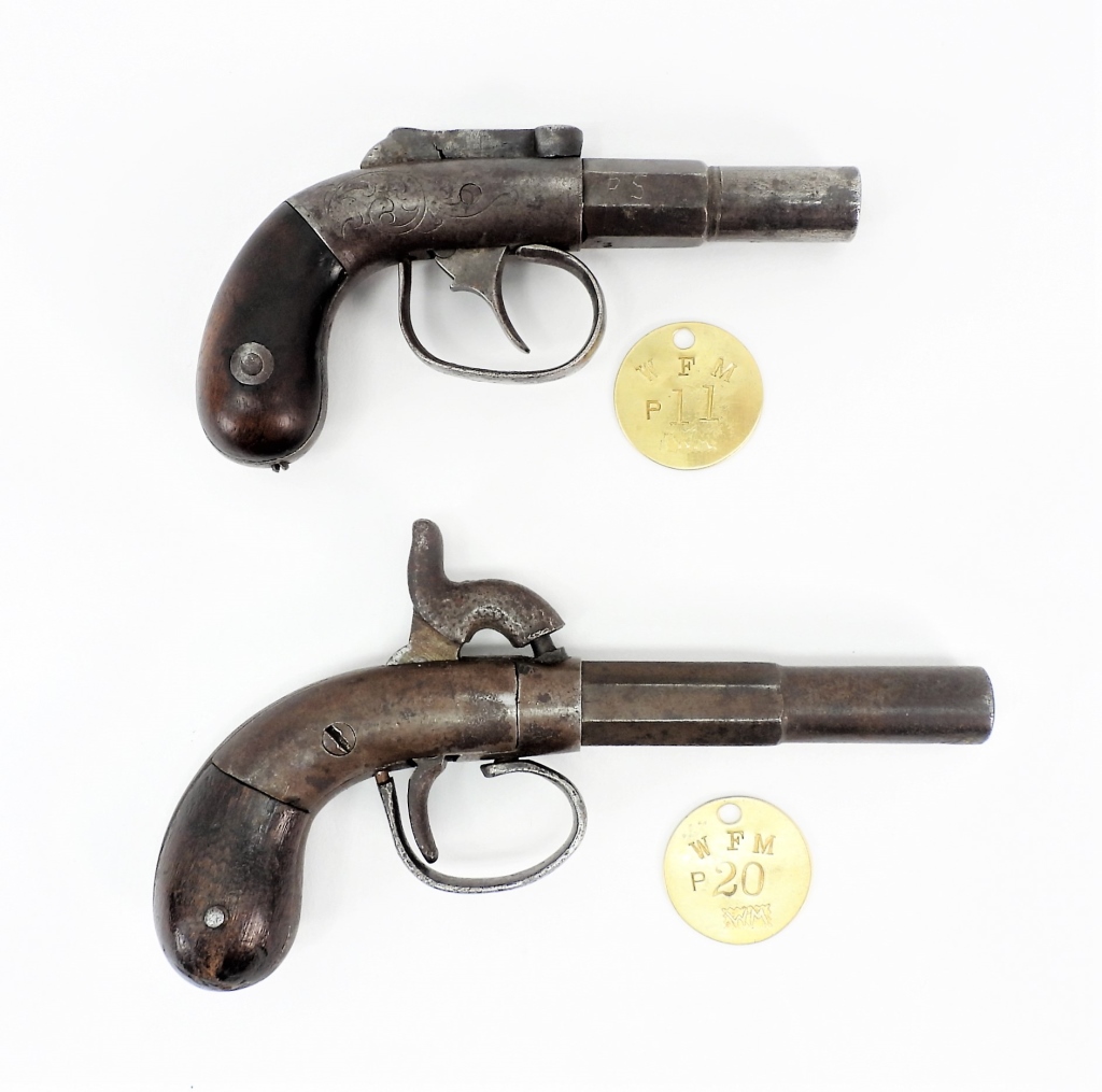 TWO SINGLE SHOT PERCUSSION PISTOLS 35e3f1