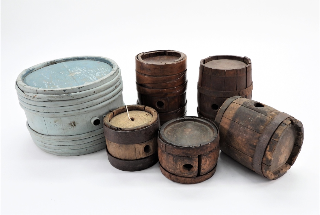 GROUP OF WOODEN CANTEENS United