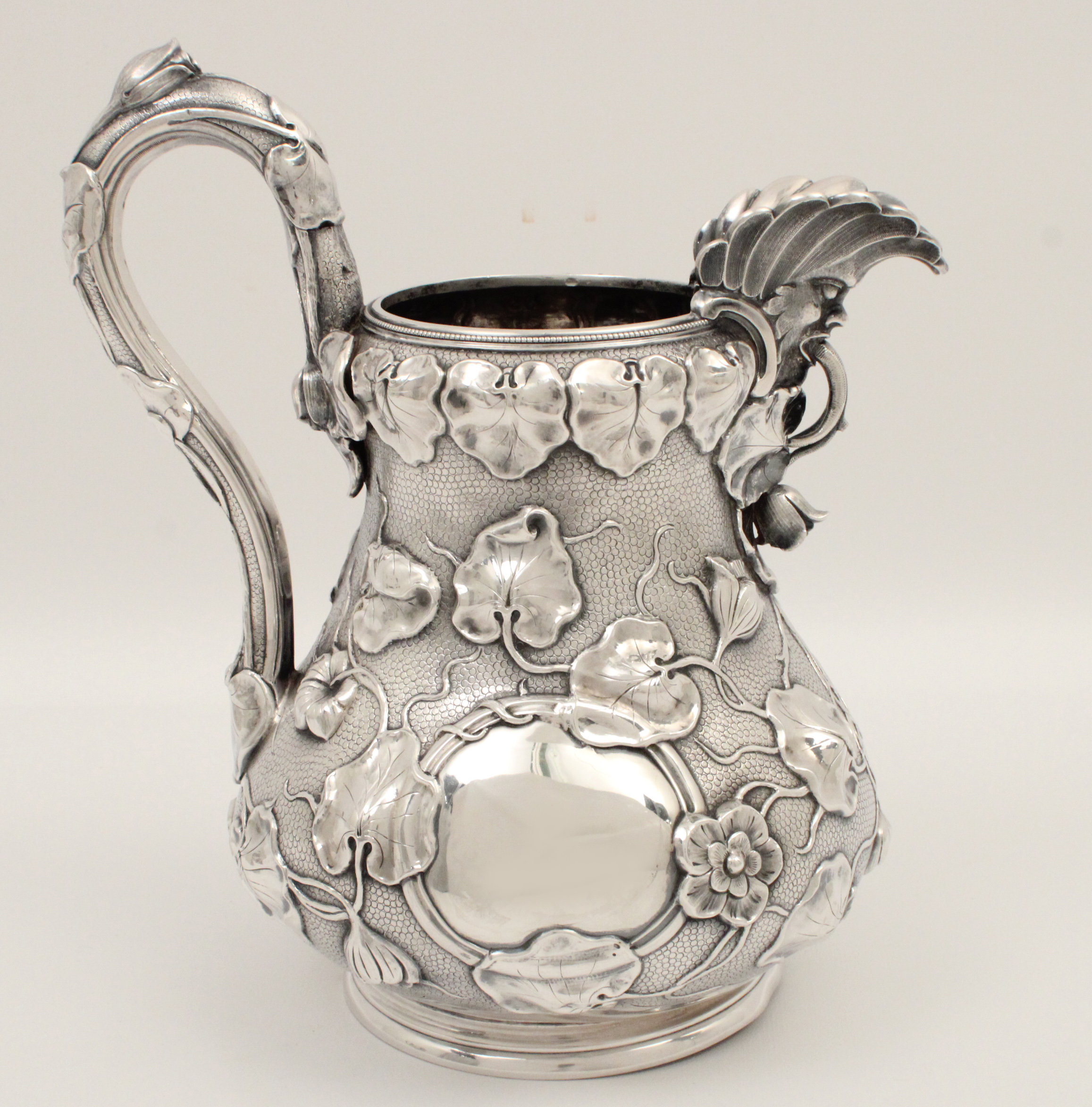 JONES, BALL, & POOR COIN SILVER PITCHER