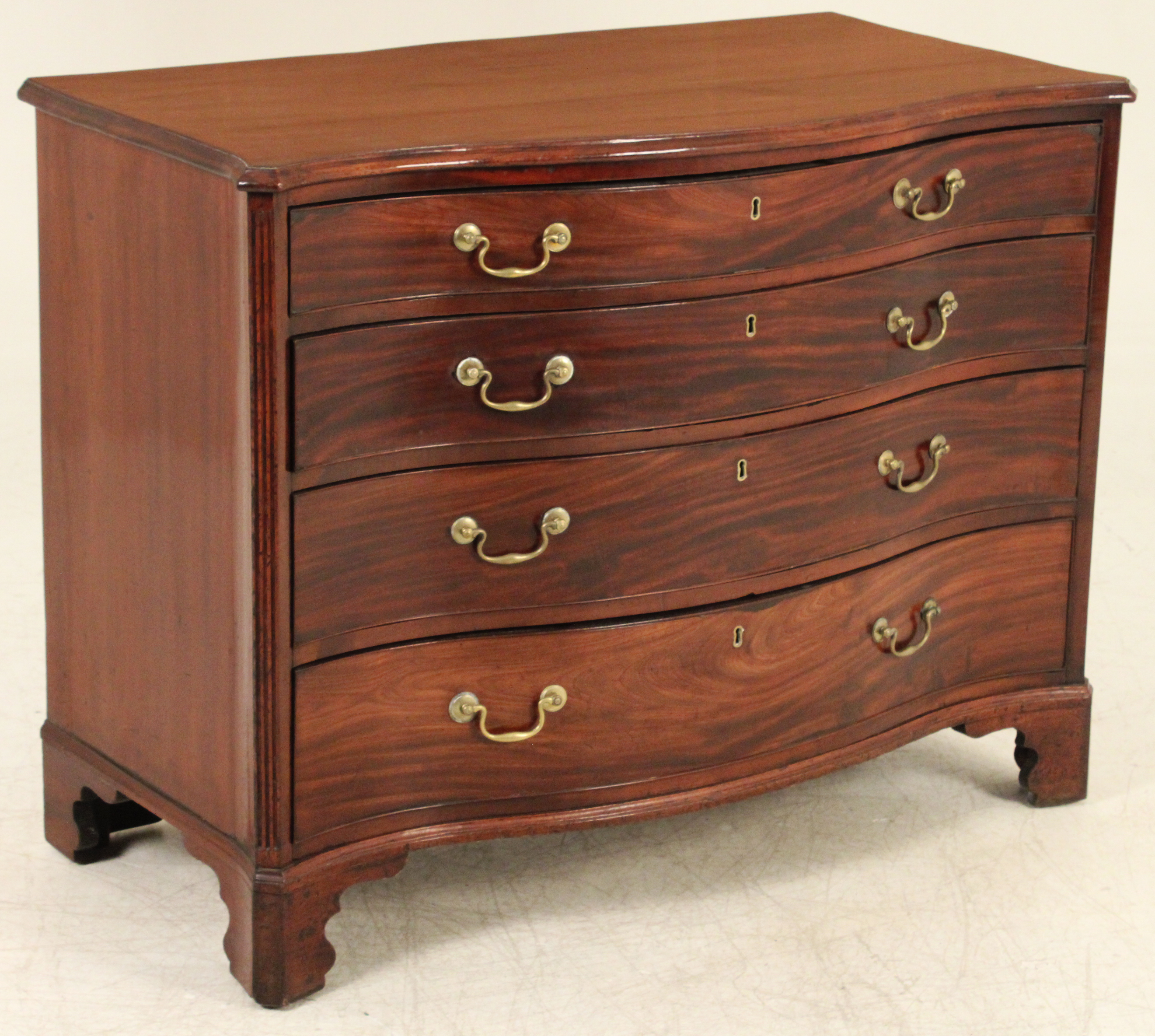 ENGLISH MAHOGANY SERPENTINE CHEST