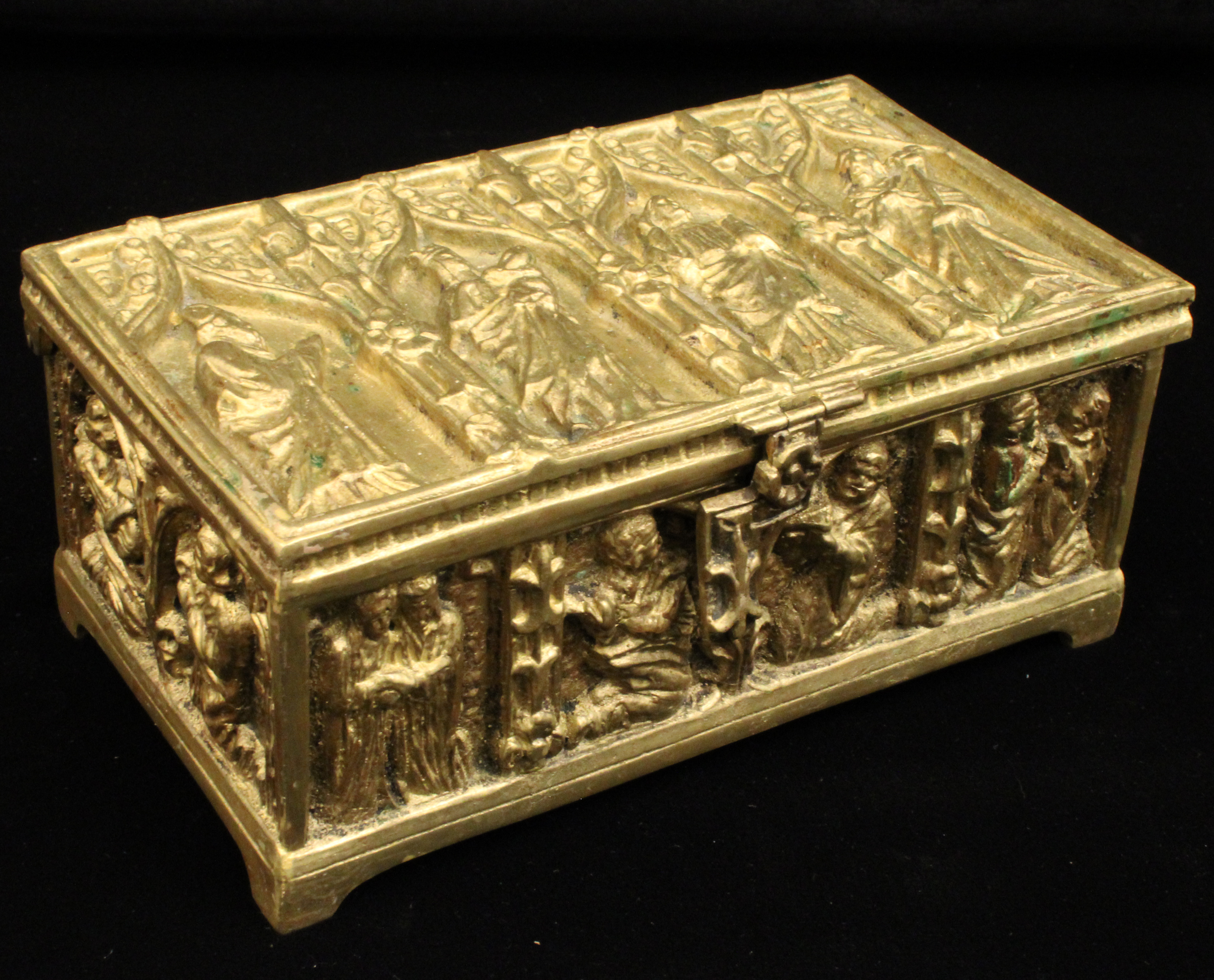 HINGED TOP BRONZE CASKET WITH VARIOUS