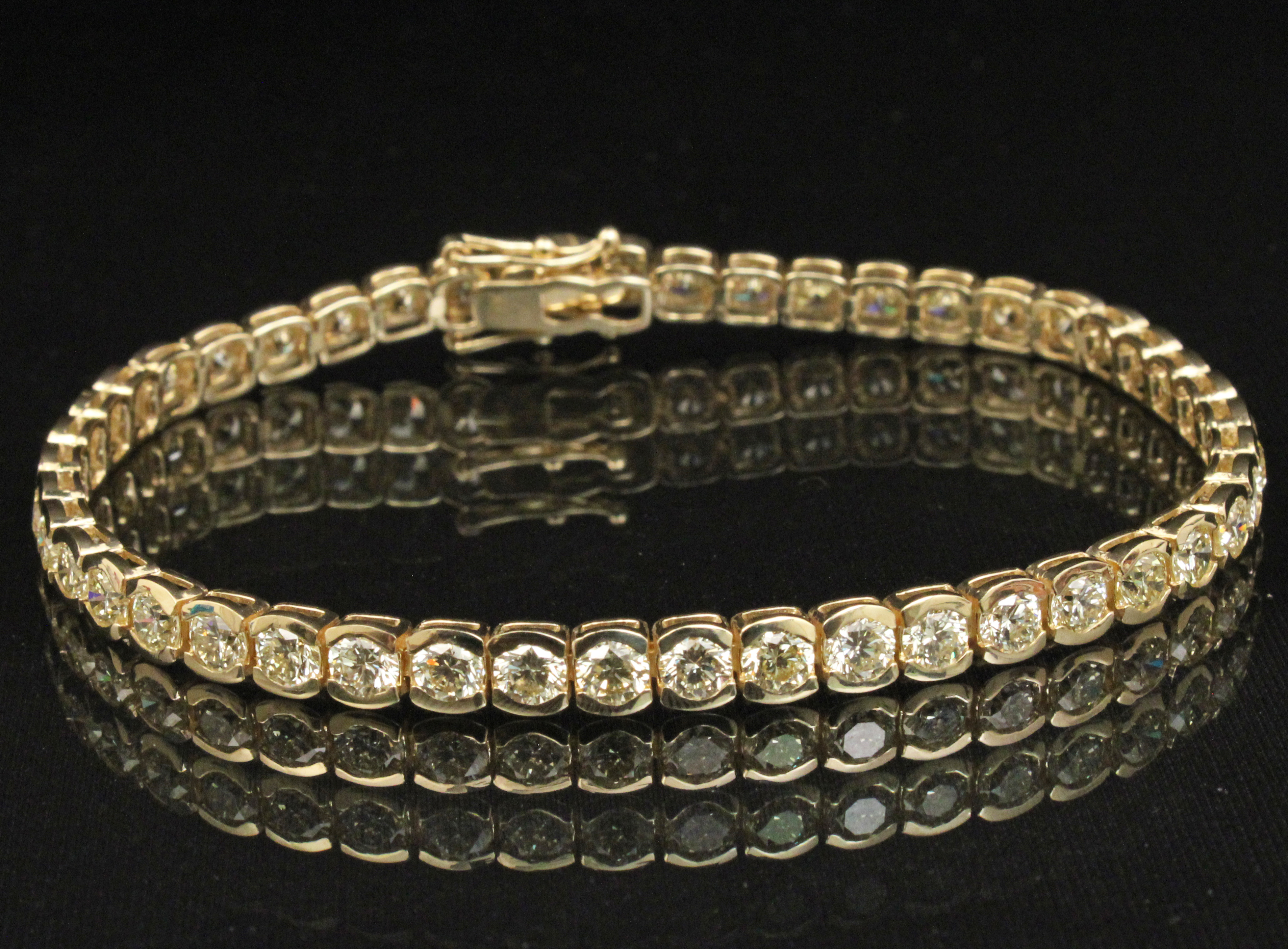 14K YG DIAMOND TENNIS BRACELET;