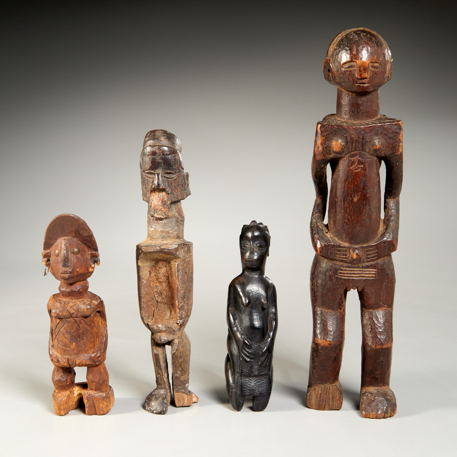 (4) OLD AFRICAN CARVED WOOD FIGURES,