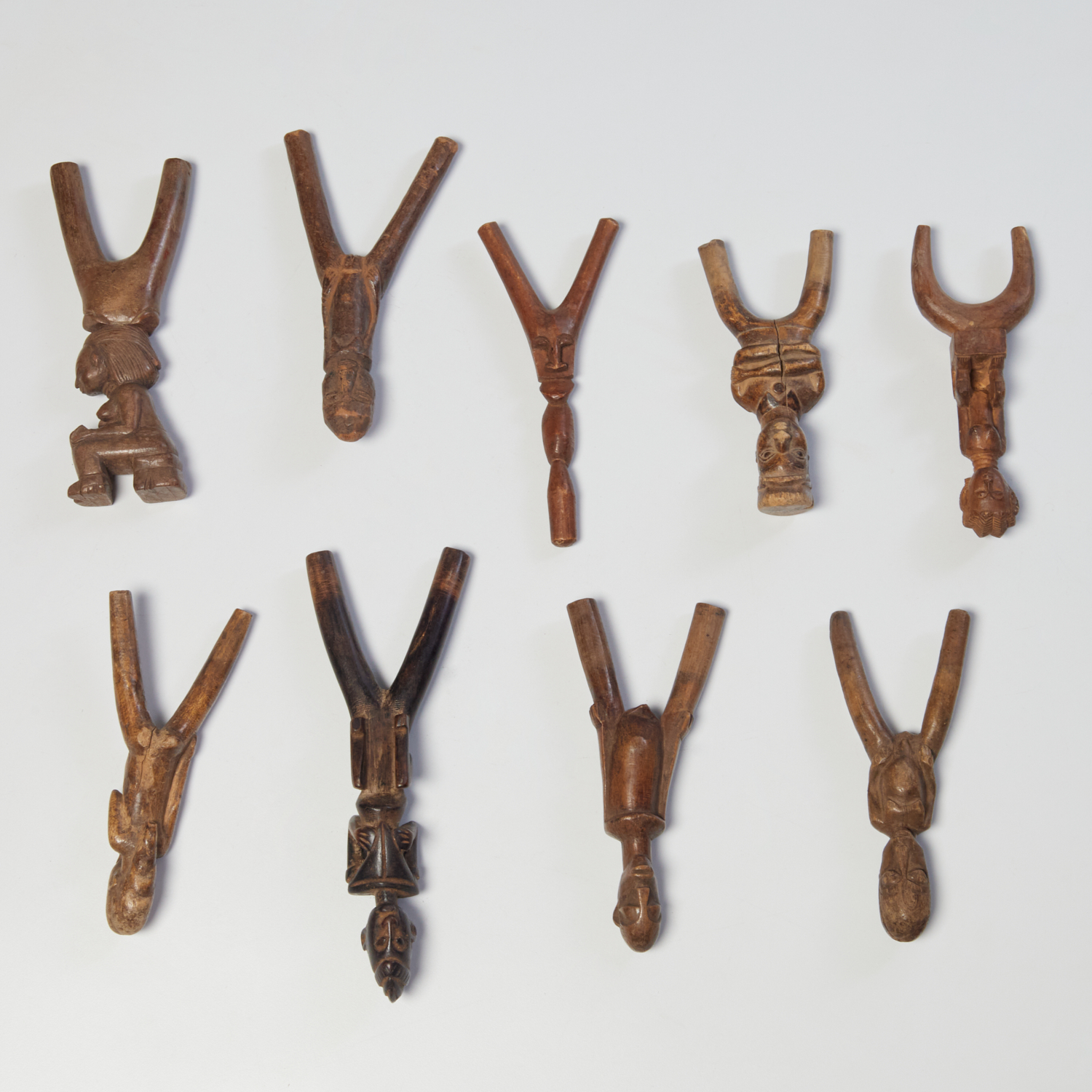 GROUP 9 AFRICAN CARVED WOOD SLINGSHOTS 361600