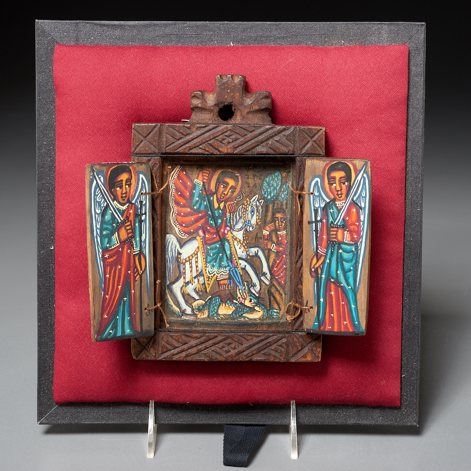 ETHIOPIAN PAINTED WOOD ICON TRIPTYCH,