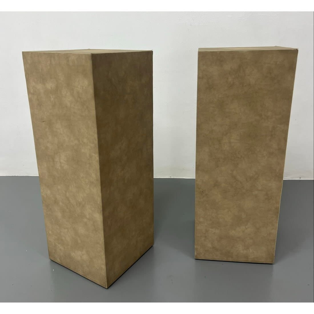 Pair Leather Covered Column Display