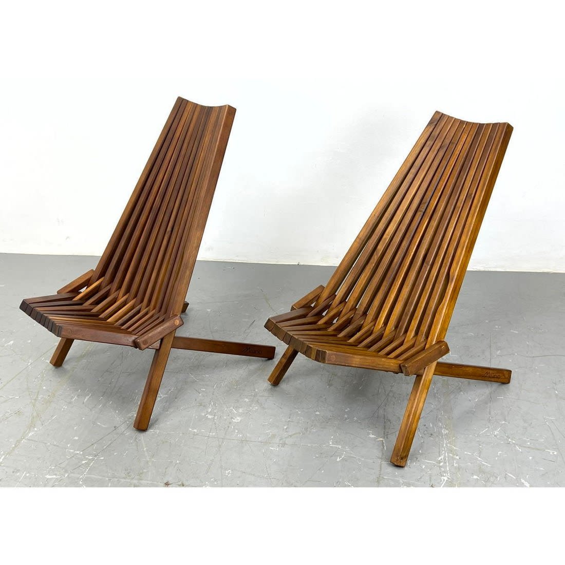 2pc MELINO Teak Folding Lounge Chairs.