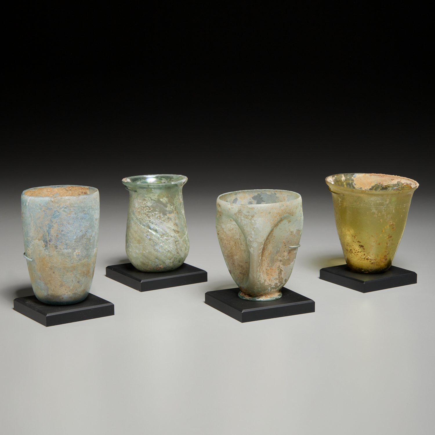 COLLECTION (4) ROMAN GLASS VESSELS