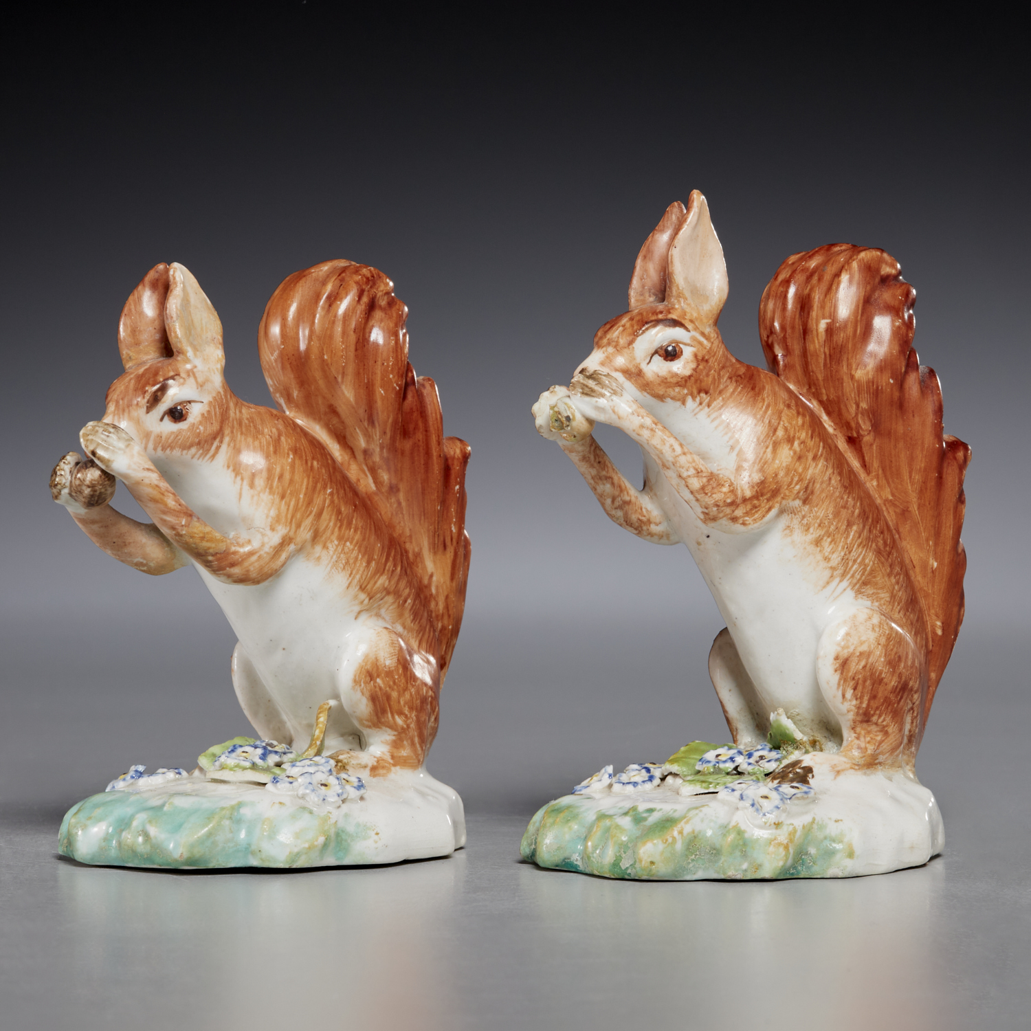 PAIR DERBY FIGURES OF SEATED SQUIRRELS,