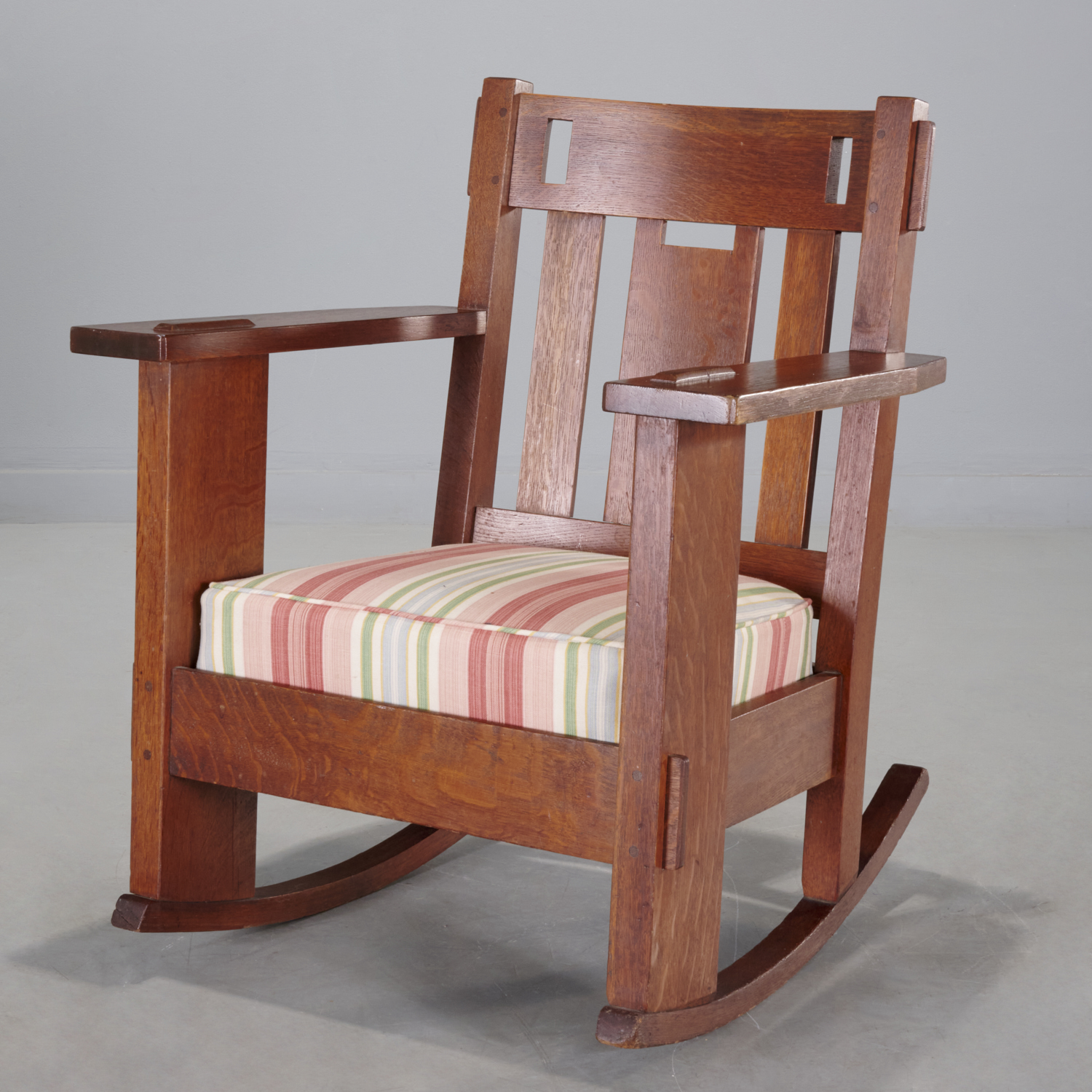 CHARLES STICKLEY, CUT-OUT OAK ROCKER