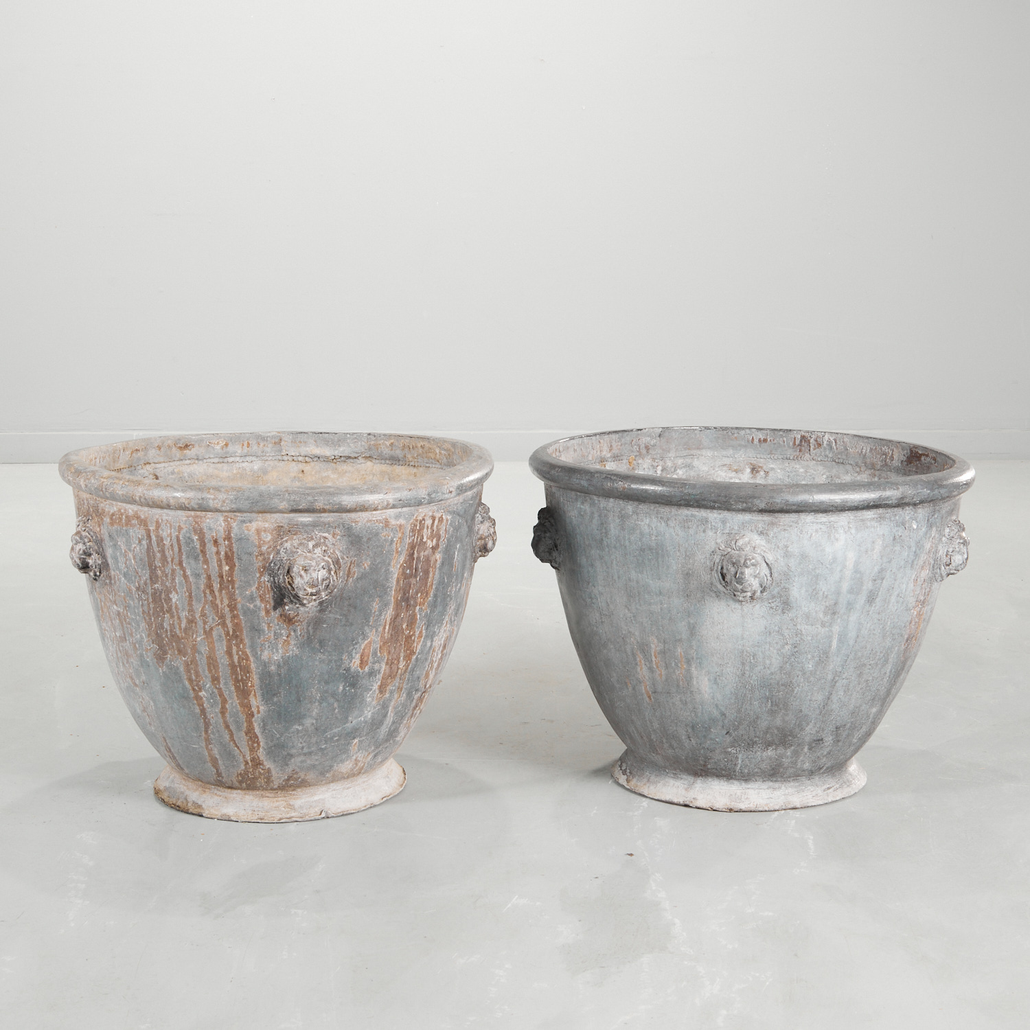 PAIR GEORGE III STYLE LEAD PLANTERS,