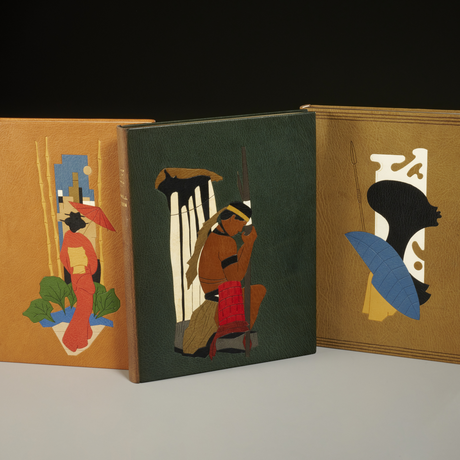 (3) MODERNIST FIGURAL LEATHER BINDINGS