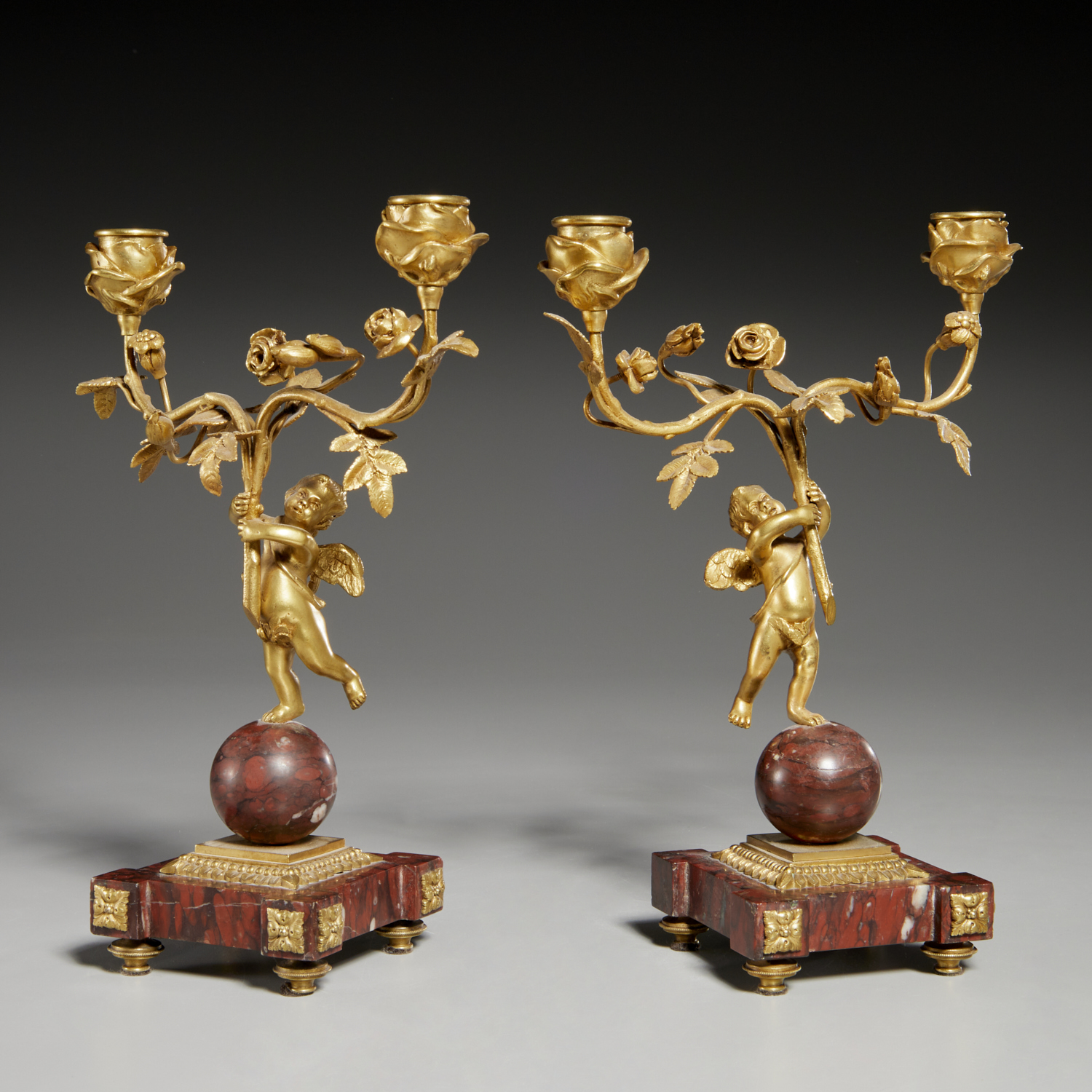 PAIR GILT BRONZE AND RED MARBLE