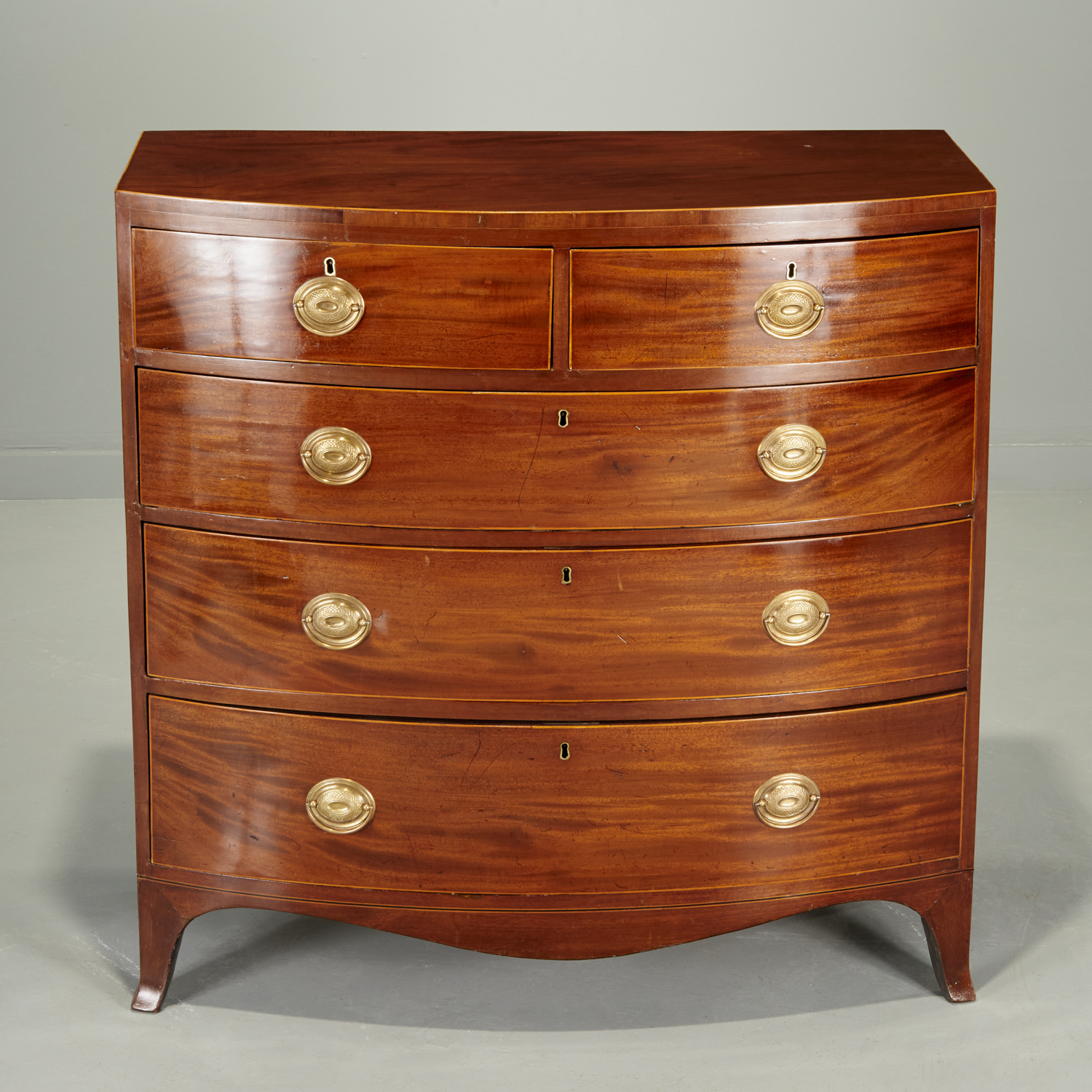 GEORGE III MAHOGANY BOW FRONT CHEST,