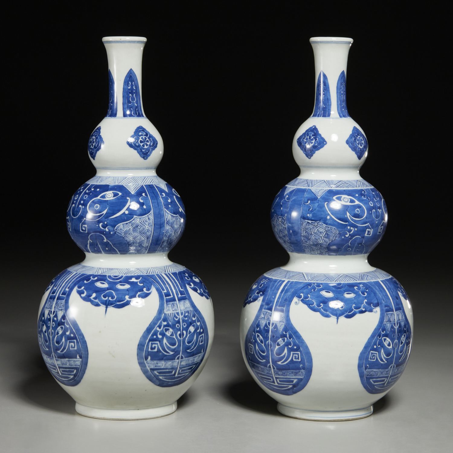 PAIR CHINESE BLUE AND WHITE TRIPLE