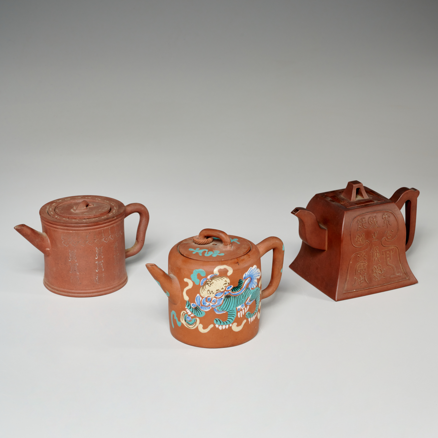 (3) CHINESE YIXING POTTERY TEAPOTS