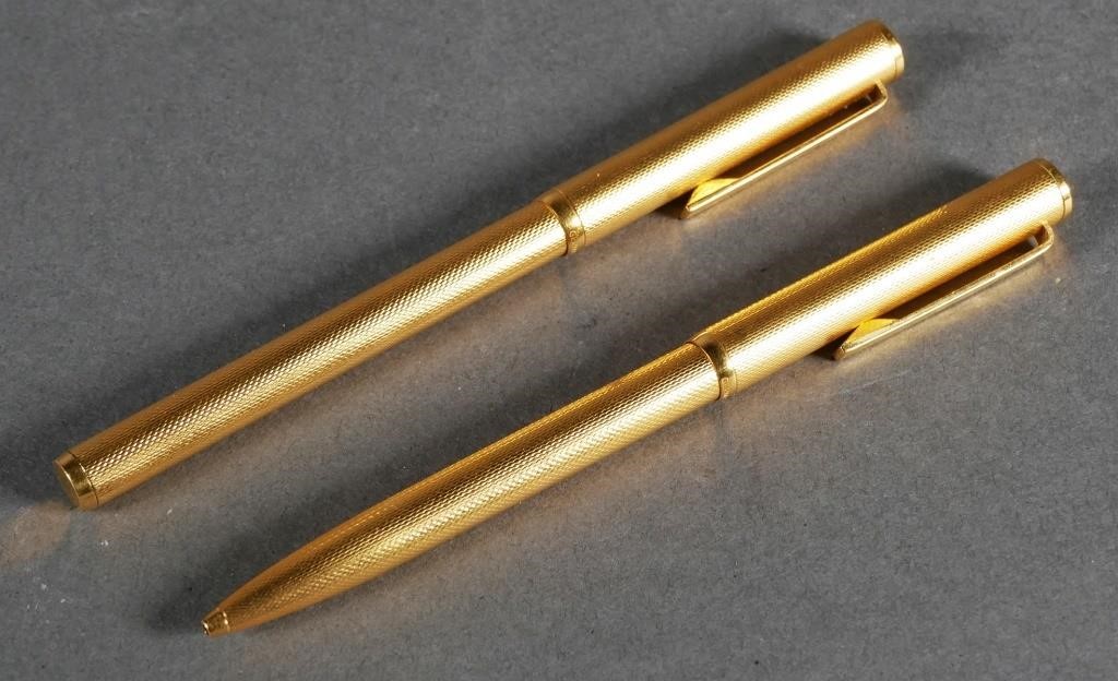 PAIR OF GOLD TONE DUNHILL PENSTwo