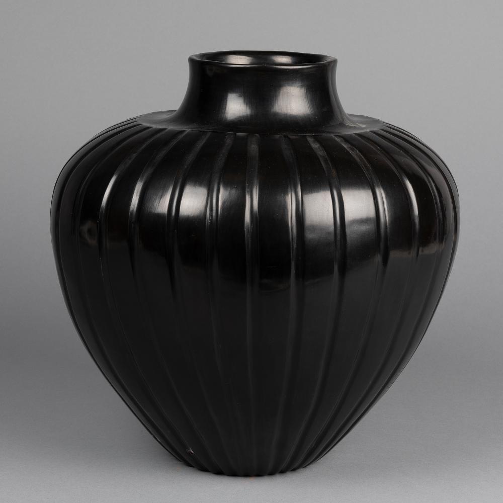 TINA GARCIA, CARVED BLACKWARE MELON