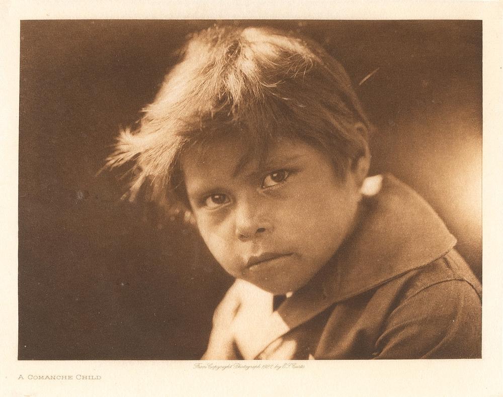 EDWARD S. CURTIS, A COMANCHE CHILD,