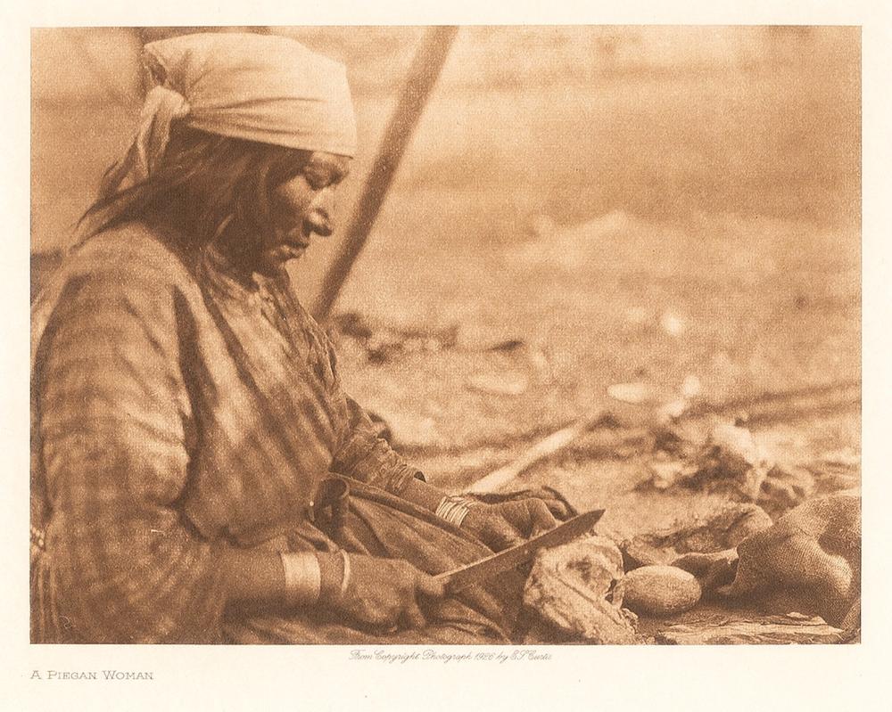 EDWARD S. CURTIS, A PIEGAN WOMAN, 1926Edward