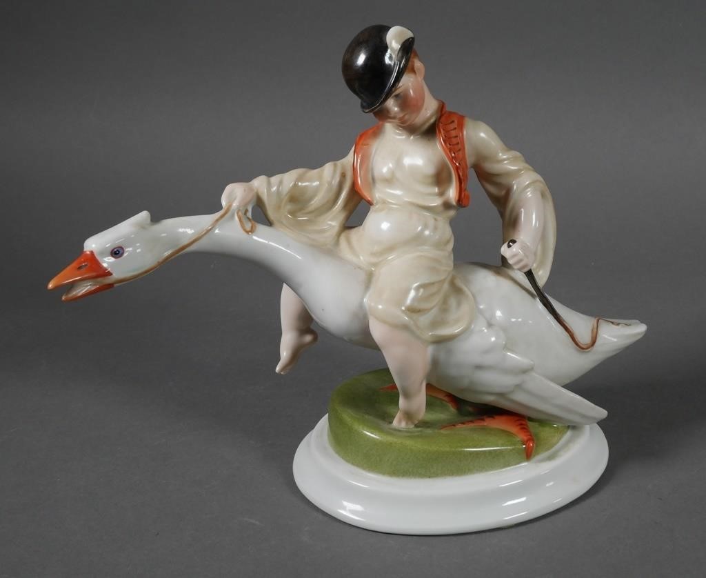 HEREND BOY AND GOOSEPorcelain boy riding