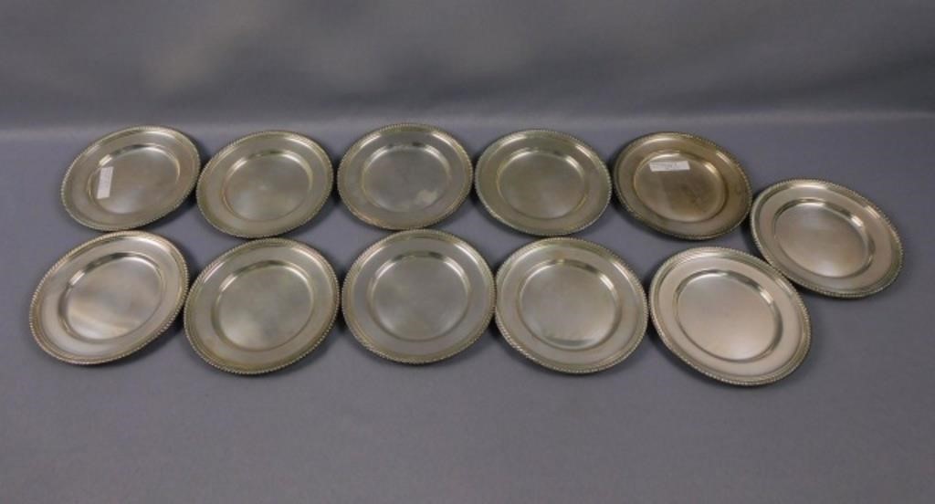11 STERLING SILVER PLATES BY GORHAM.