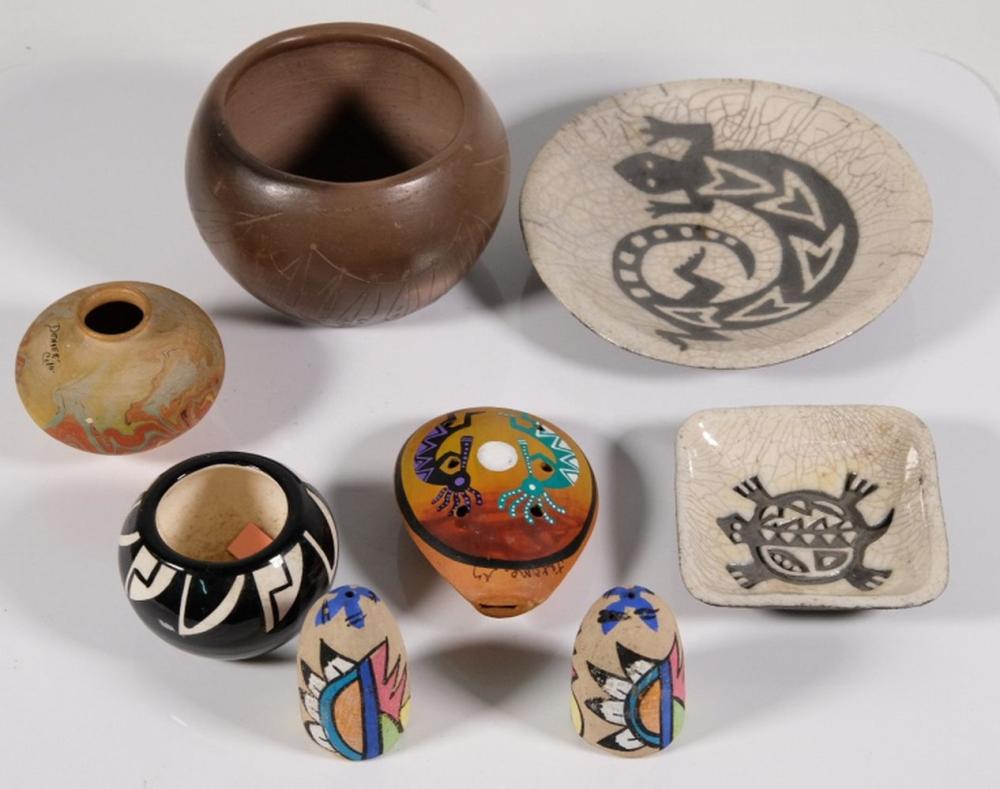 EIGHT PIECES OF POTTERY; INUIT