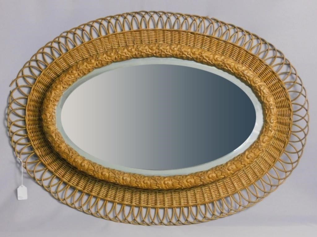 RARE OVAL WICKER MIRROR, CA. 1900.