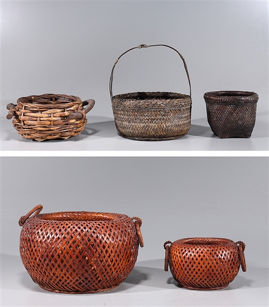 Group of six various wicker baskets;