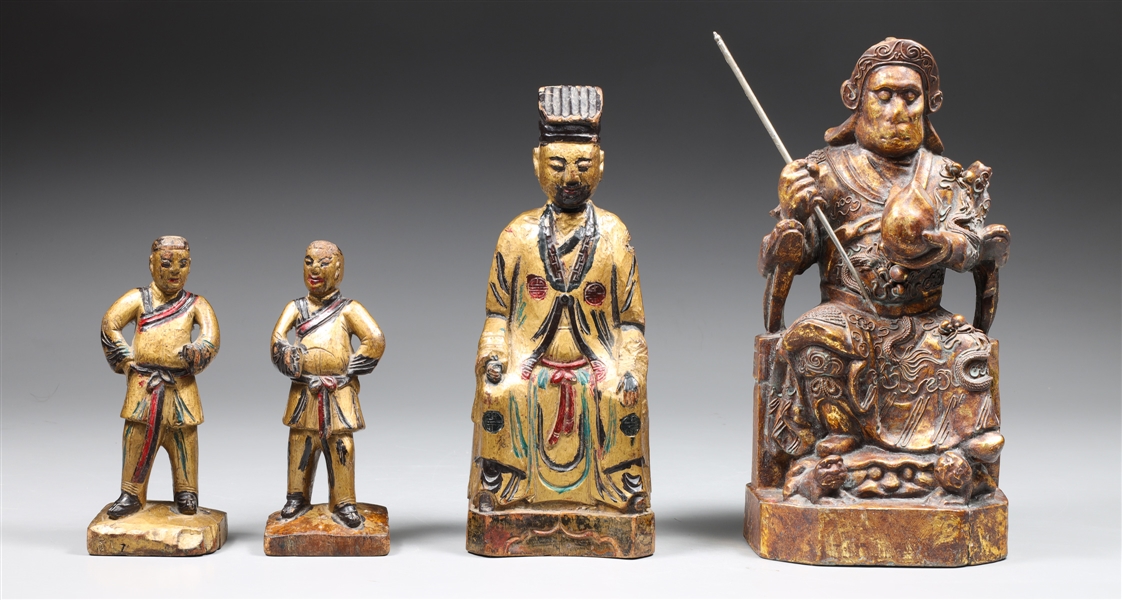 Group of four carved Chinese figural