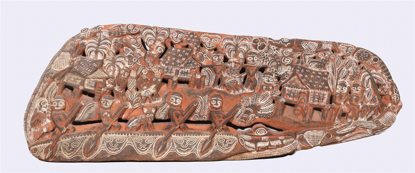 Carved African tribal panel, depicting,