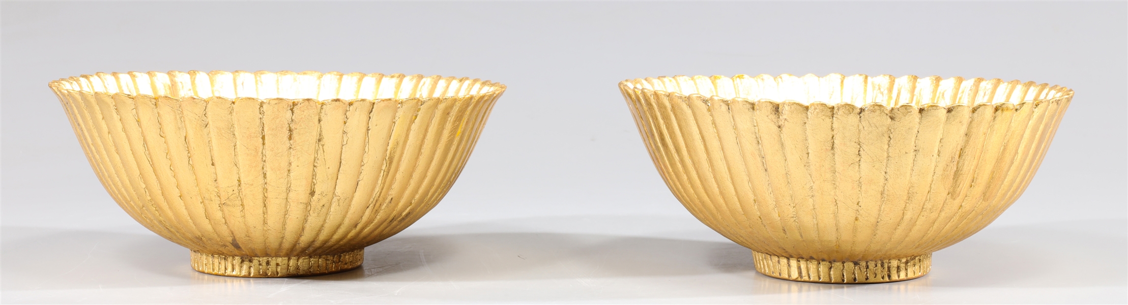 Pair of gilded ceramic flower form