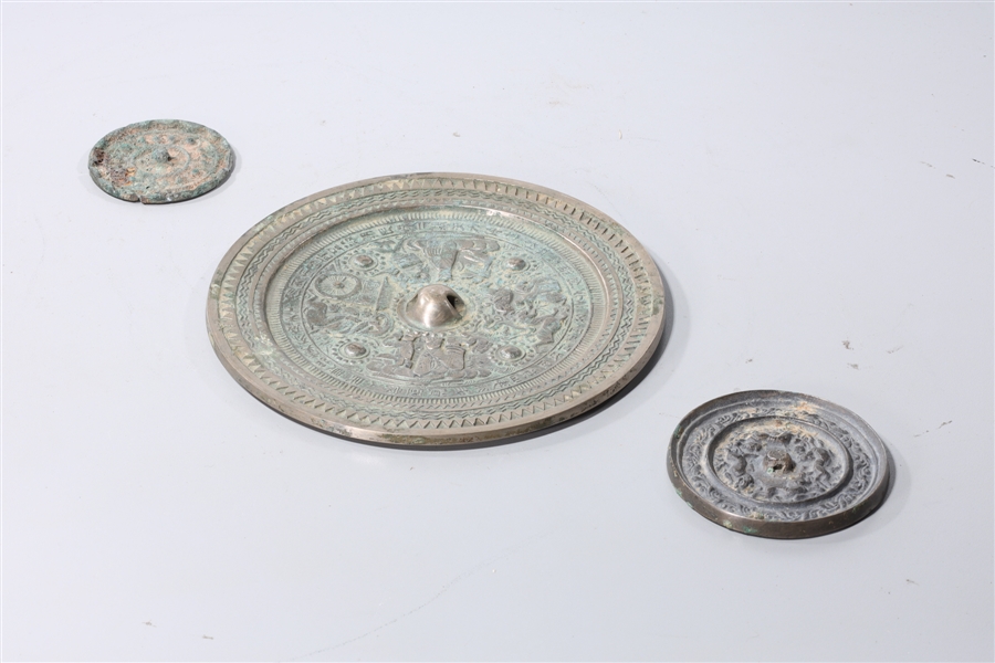 Group of three Chinese bronze mirrors  366b51