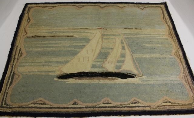 EARLY 20TH C HOOKED RUG DEPICTING