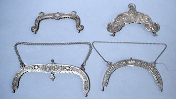 Four elaborate antique silver purse