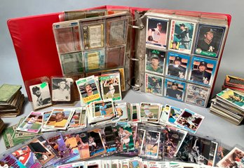 A collection of baseball cards mostly