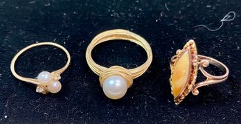 A 14k pearl ring with brushed surface,