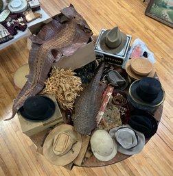 A table lot of vintage hats, and