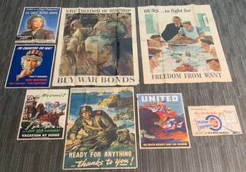 Eight vintage war bond posters,