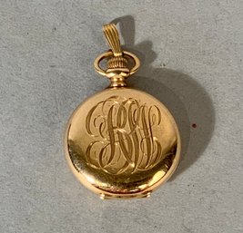 An antique 14K gold pocket watch with