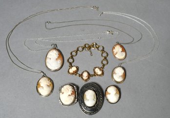 Seven antique cameo pins/pendants