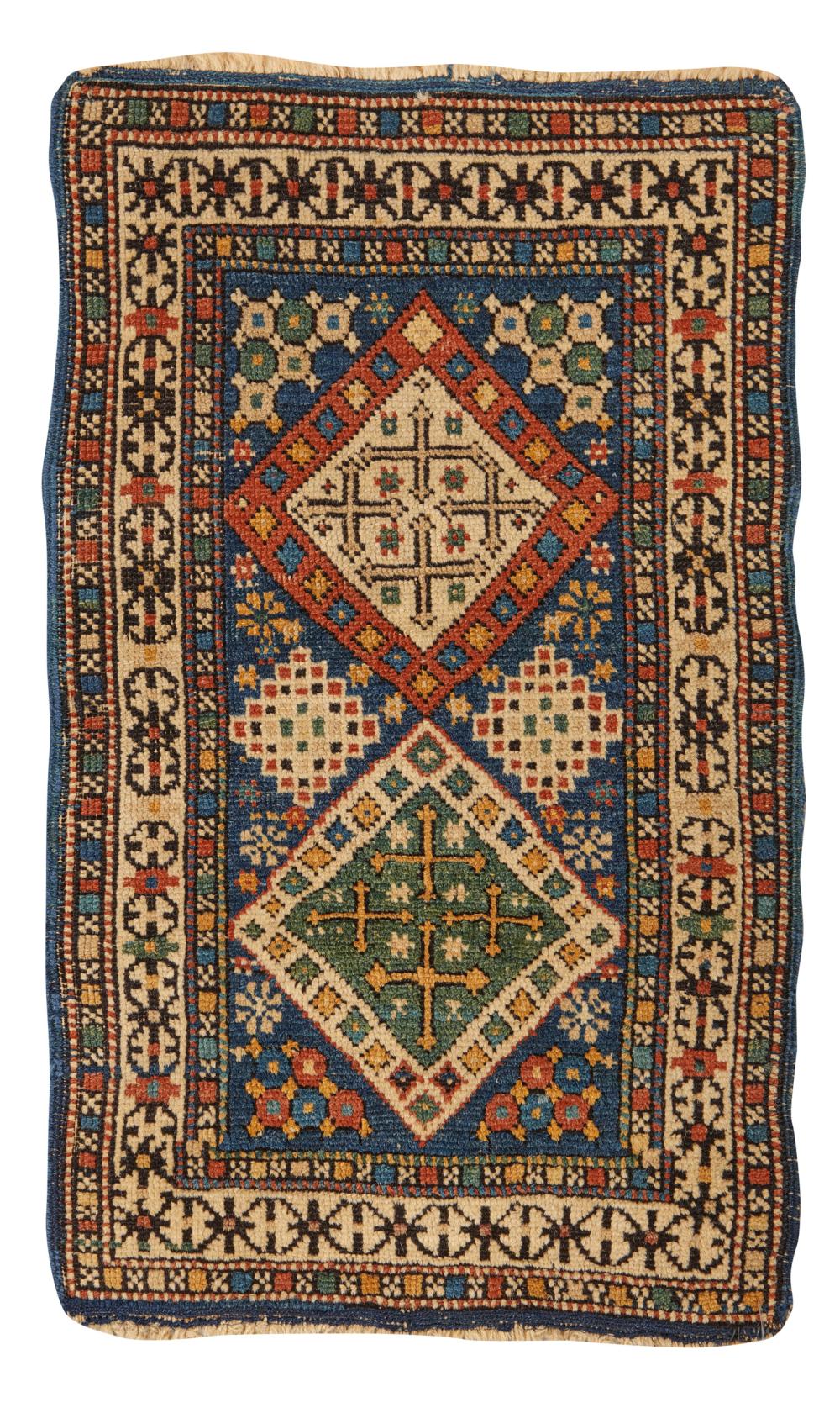 UNUSUAL SMALL FORMAT KUBA RUG,