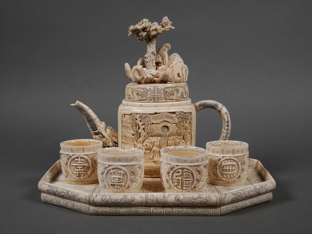 ANTIQUE CHINESE CARVED IVORY TEA SETAntique